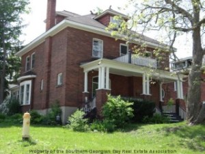 This house has six bedrooms, four floors, and a butler's staircase. Crazytown.