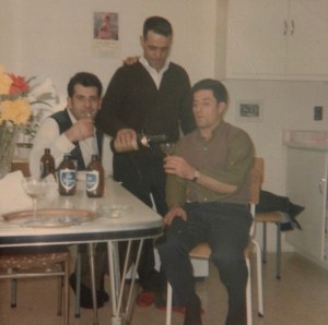 Serving alcohol - as he always did when there were guests