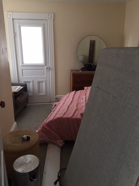 Small room filled with construction supplies